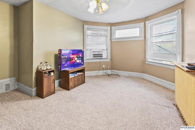 recreation room featuring cooling unit, ceiling fan, and carpet floors