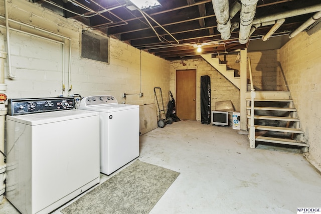 washroom featuring independent washer and dryer