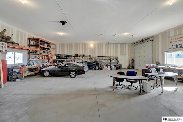 garage with a workshop area