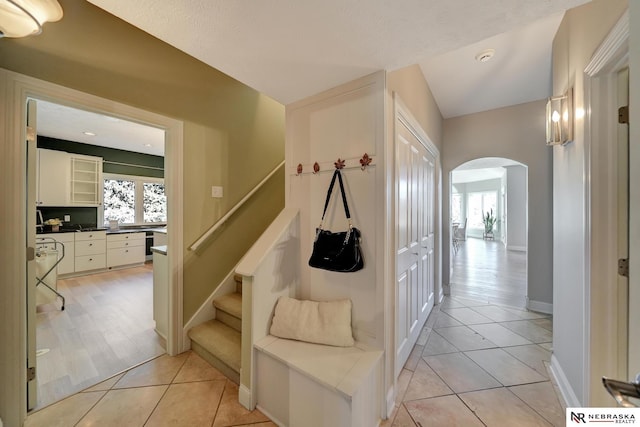 mudroom featuring light tile patterned flooring