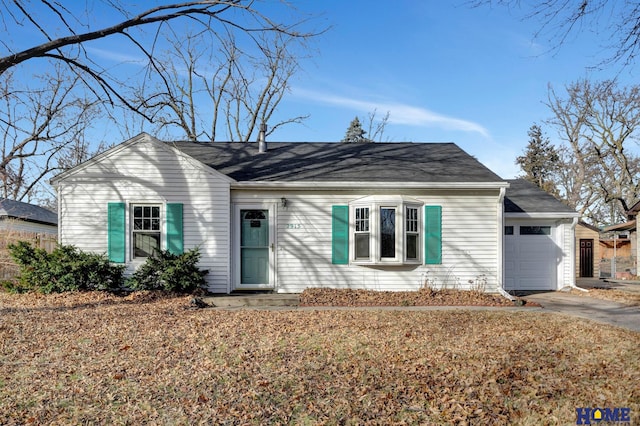 ranch-style house featuring a garage