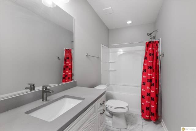 full bathroom featuring vanity, toilet, and shower / bath combo with shower curtain