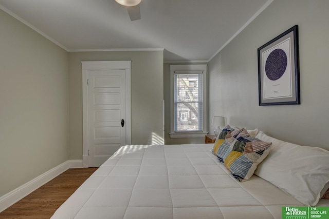 bedroom with ornamental molding, light hardwood / wood-style floors, and ceiling fan