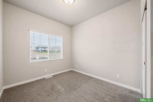 view of carpeted spare room