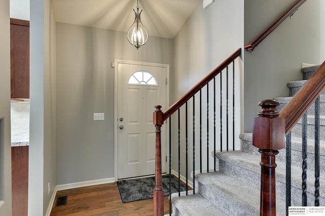 foyer entrance featuring hardwood / wood-style floors