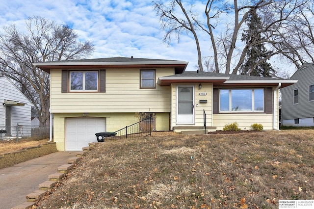 tri-level home featuring a garage