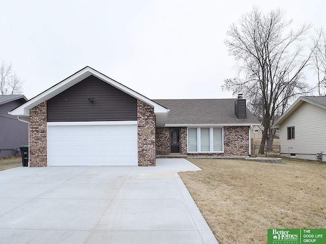 ranch-style home featuring a garage and a front lawn