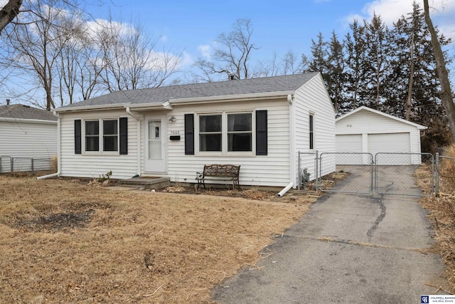 view of front of house with an outbuilding and a garage