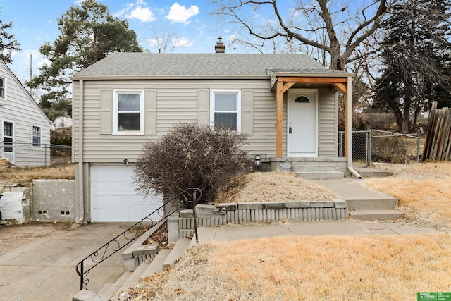 view of front of home featuring a garage