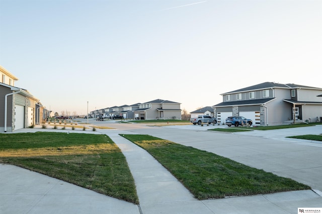 view of yard at dusk