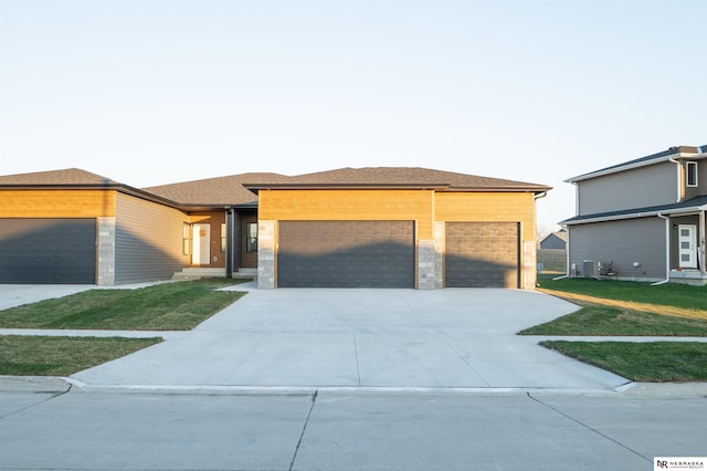 prairie-style house featuring a front yard