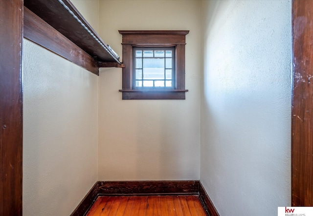 walk in closet featuring wood-type flooring