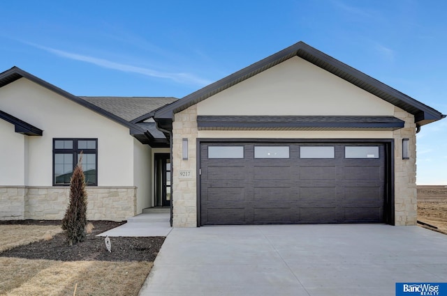 view of front of home with a garage