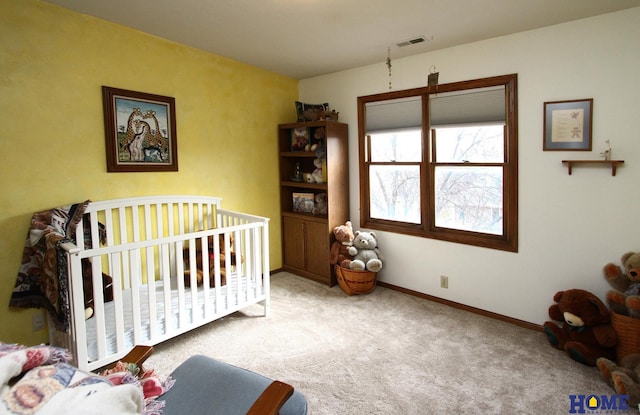 bedroom with light carpet