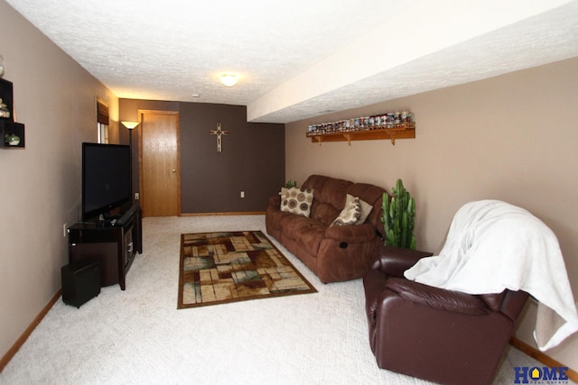 carpeted living room featuring a textured ceiling