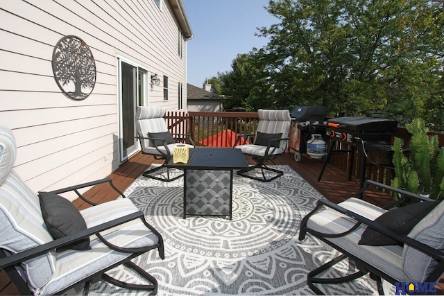 wooden terrace with area for grilling