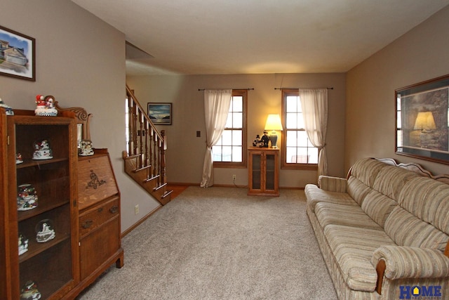 living room featuring light carpet