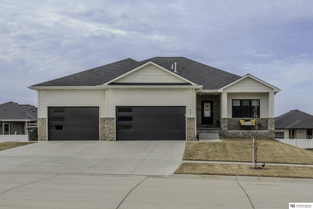 view of front of home with a garage