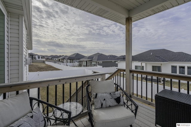 wooden balcony featuring a deck