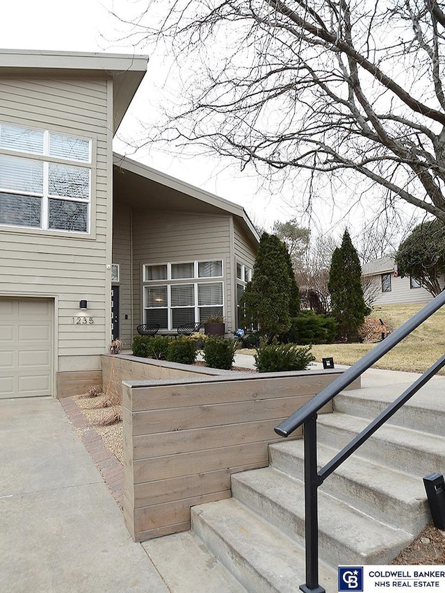 exterior space featuring a garage