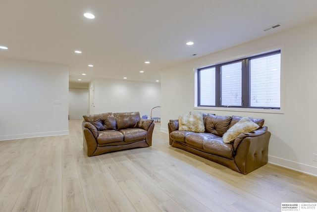 living room featuring light hardwood / wood-style floors