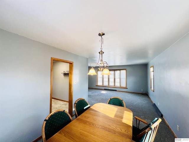 carpeted dining space with an inviting chandelier