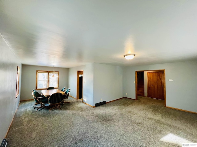 dining room with carpet floors