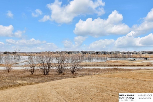 view of yard with a rural view