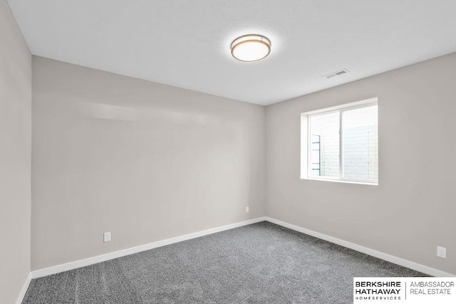 unfurnished room with carpet