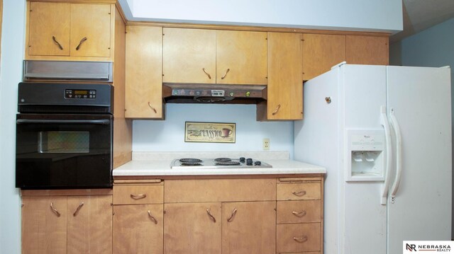 kitchen with white appliances and ventilation hood