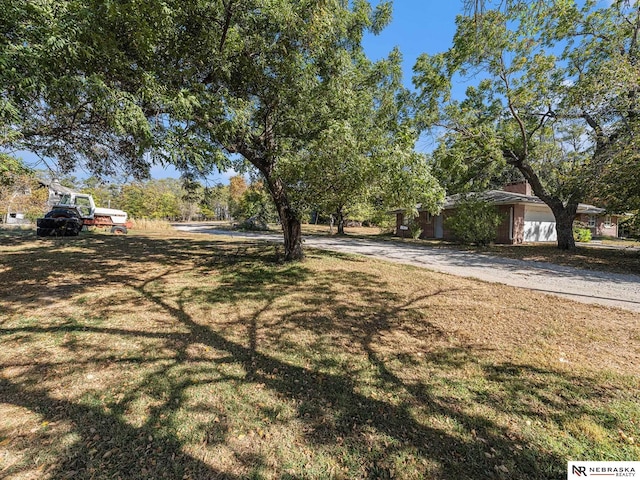 view of yard with a garage