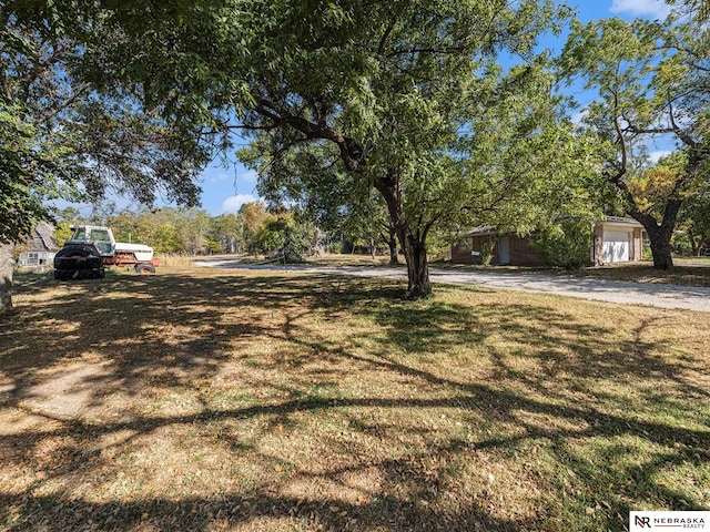 view of yard with a garage