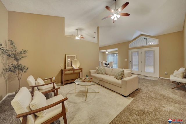 carpeted living room featuring lofted ceiling and ceiling fan