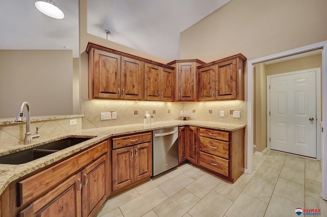 kitchen featuring sink, light tile patterned floors, dishwasher, light stone countertops, and decorative backsplash