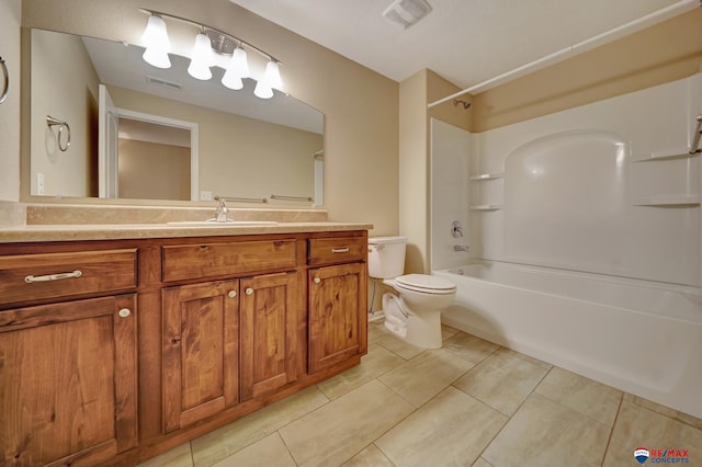 full bathroom featuring vanity, tile patterned flooring, shower / bathtub combination, and toilet