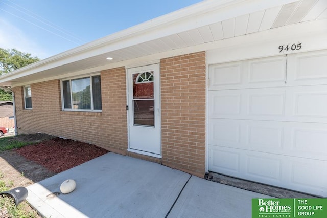 property entrance featuring a garage