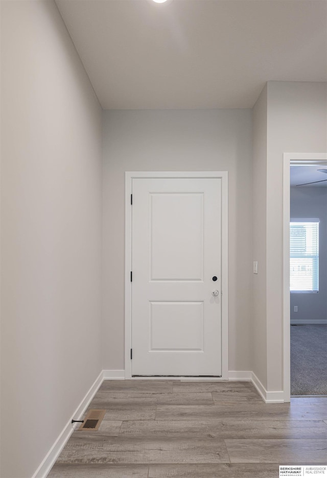 doorway to outside featuring light wood-type flooring