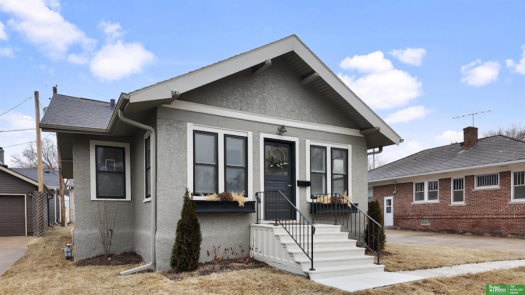 bungalow-style house with a garage