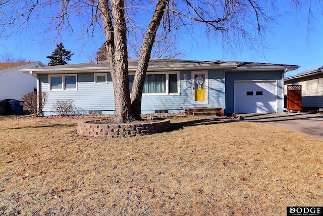 single story home featuring a garage and a front yard