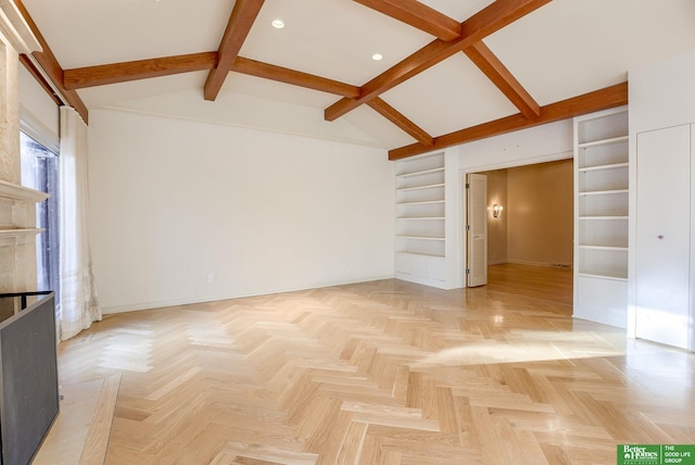 unfurnished living room with vaulted ceiling with beams, built in features, and light parquet floors