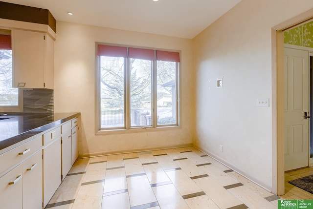 kitchen with white cabinets