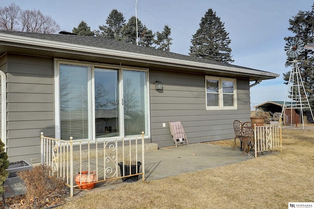 back of property featuring a patio area