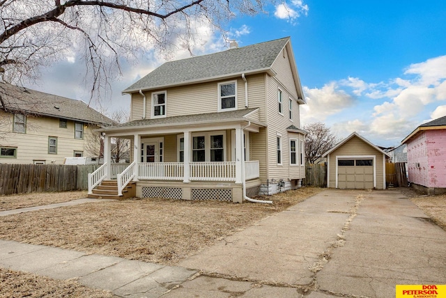 view of front of home with a garage, an outdoor structure, and covered porch