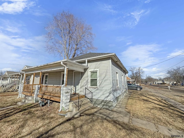 bungalow-style home featuring a porch