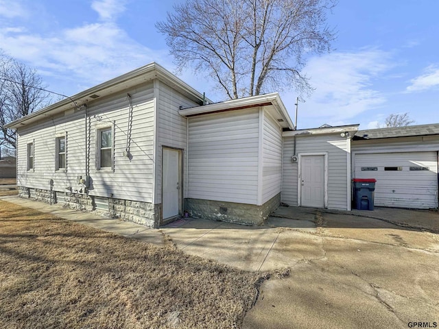 view of home's exterior featuring a garage