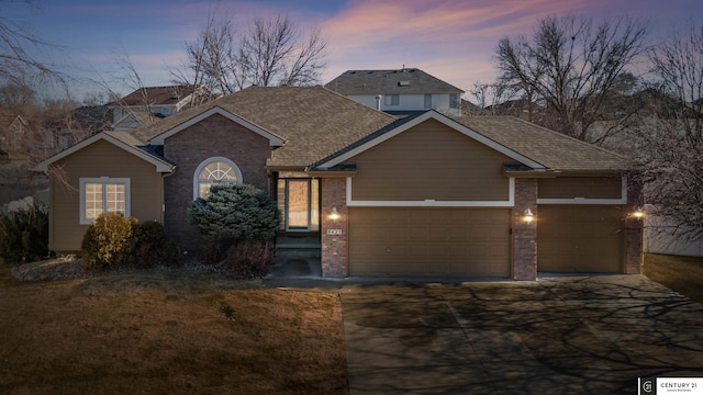 view of front of property with a garage