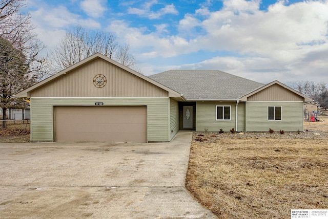 single story home featuring a garage