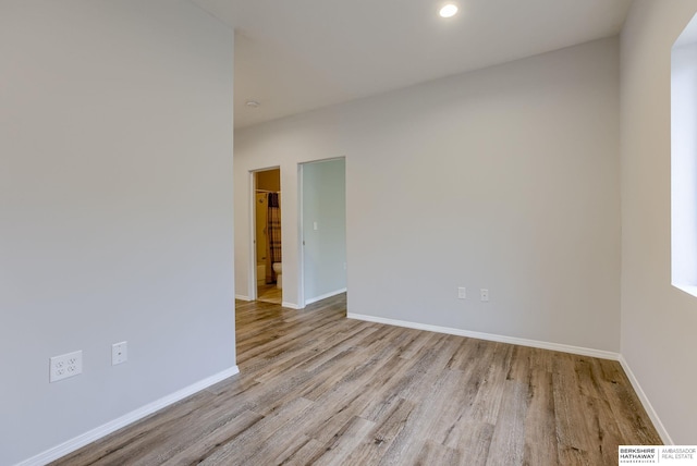 unfurnished room featuring light wood-type flooring