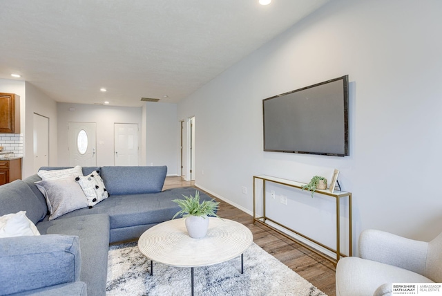 living room with hardwood / wood-style flooring