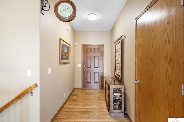 doorway to outside featuring light hardwood / wood-style flooring